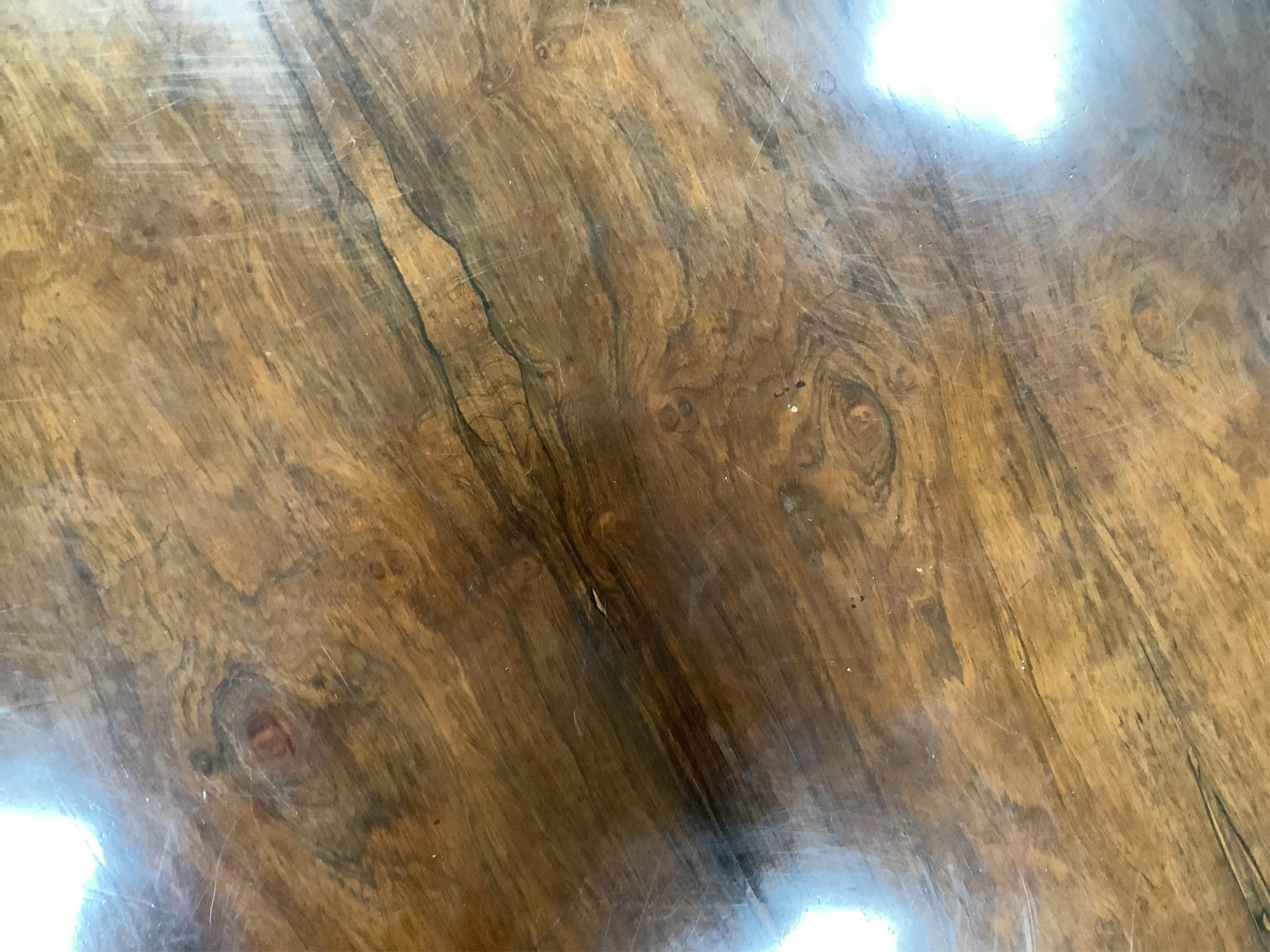 An early Victorian circular rosewood tilt top breakfast table, diameter 128cm, height 72cm